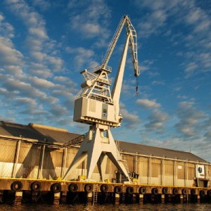 a crane working in a harbor