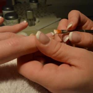 manicure being done with hazardous chemicals