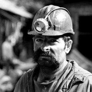 a miner in a dangerous workplace