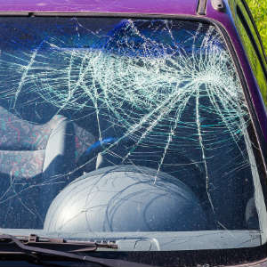 windshield damaged due to distracted driving